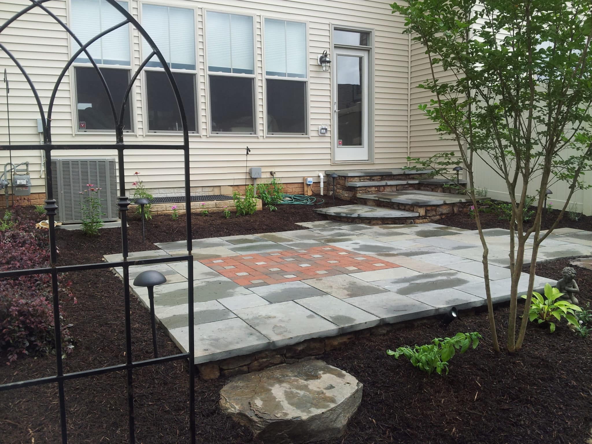 Flagstone Patio with Brick Inset