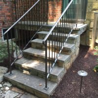 New Cantilevered Landing and Steps on Historic Home