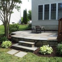 231 Above-Grade Flagstone Patio with Stone Veneer and Stone Steps