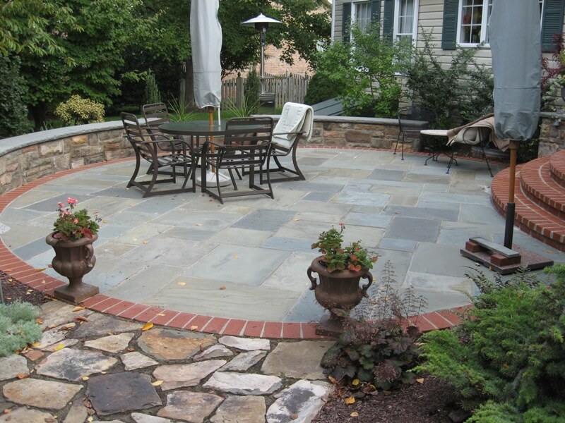 237 Circular Flagstone Patio with Brick Border and Capped Stone Sitting Wall