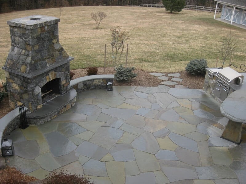 238 Flagstone Patio with Stone Outdoor Fireplace and Curved Stone Sitting Walls