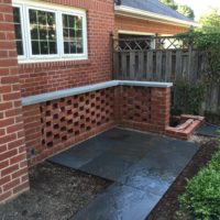 364 Pierced Brick Privacy Wall with Flagstone Cap