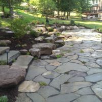 372 Informal Loosely-Laid Flagstone Patio with Boulders and Water Feature