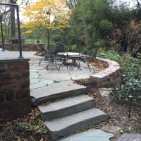 380 Informal Patio with Stone Retaining Wall and Stone Steppers to Flagstone Pathway