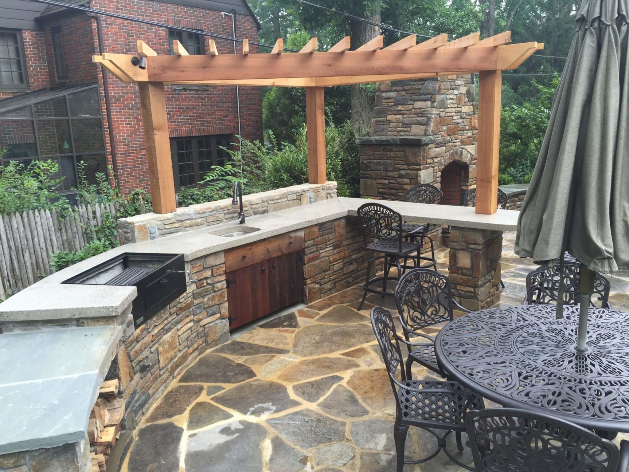 398 Outdoor Kitchen and Fireplace in Baltimore Wall Stone with Custom Cedar Pergola