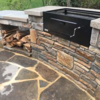 529 Built In Charcoal Barbecue with Baltimore Wall Stone and Concrete Countertop