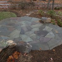 533 Informal Patio in Circular Shape with Irregular Flagstone and Flagstone Steppers