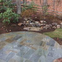 534 Flagstone Patio with Pondless Waterfall, Delaware Gravel and Boulders