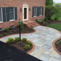558 Gracious Flagstone Entry with Brick Edging