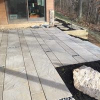 581 Lower Level, Under-Deck Patio with Techo-Bloc Aberdeen Pavers and Mexican Beach Pebbles