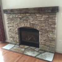 592 Renovated Fireplace with Rustic Wood Mantle