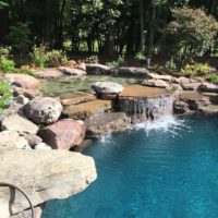 606 Residential Pool with PA Boulder Waterfall and Naturalized Edge