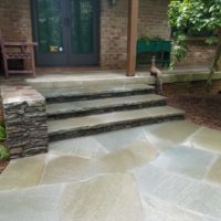Renovated Front Steps Feature Stone Wall and Irregular Flagstone