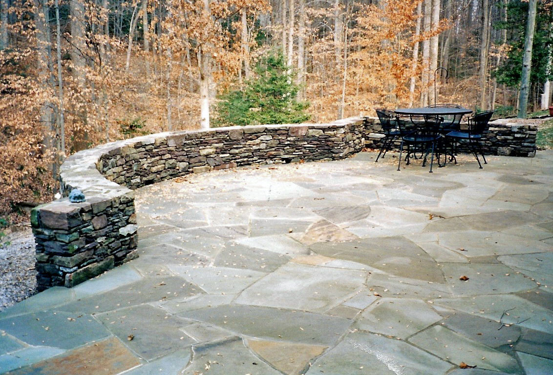 Flagstone Patio with Stone Wall