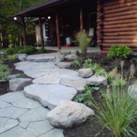 Informal Front Walkway with Boulders and Stone Slab Steppers