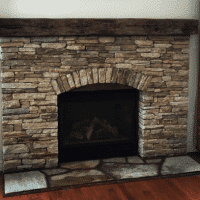 Stone Wall Fireplace Done by Poole's Stone and Garden in Bethesda MD