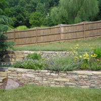 Terraced Gardens Features Stone Retaining Walls and Oakmont Steppers