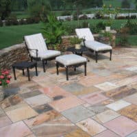 10 Stone Patio and Curved Stone Sitting Wall with Capped Column