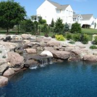 117 Pool with Boulder Waterfall Built Into Hillside