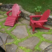 Loosely Laid Flagstone Patio with Stone Retaining Wall