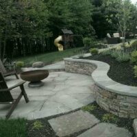 Flagstone Patios with PA Beige Stone Wall and Stairs with Flagstone Treads