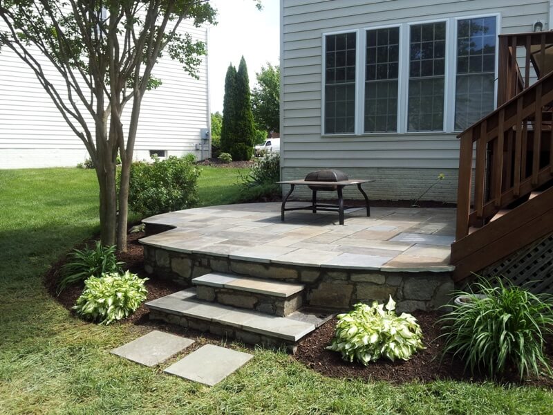 231 Above-Grade Flagstone Patio with Stone Veneer and Stone Steps