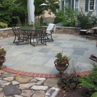 237 Circular Flagstone Patio with Brick Border and Capped Stone Sitting Wall