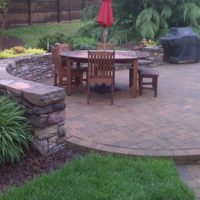 239 Circular Paver Patio and Double-Sided Stone Garden and Retaining Wall