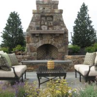 247 Stone Fireplace with Reclaimed Timber Mantle and Flagstone Capped Hearth