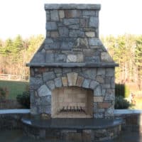 261 Lake George Stone Fireplace with Flagstone Hearth and Stone Sitting Walls