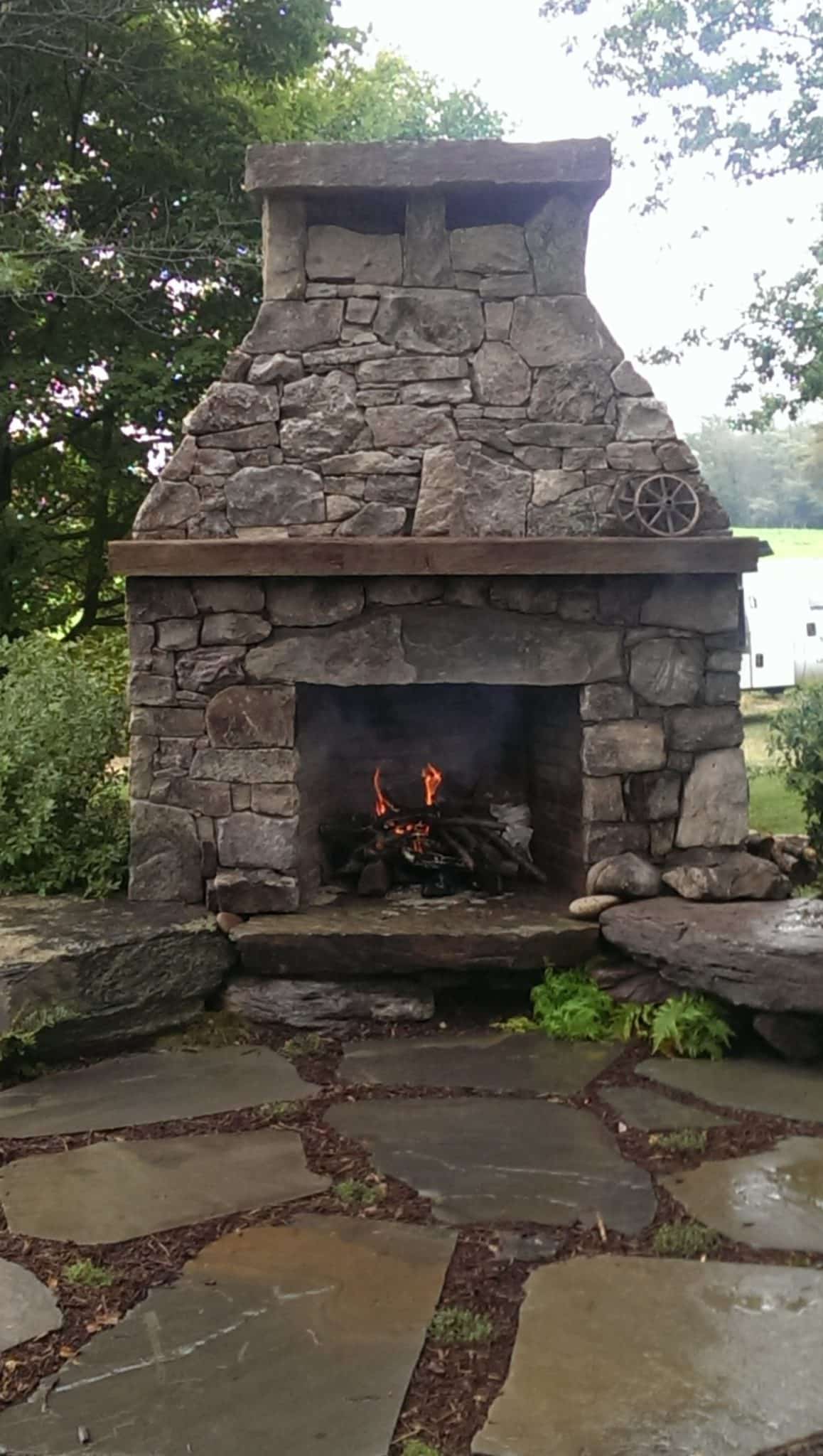 265 Stone Fireplace and Boulder Benches