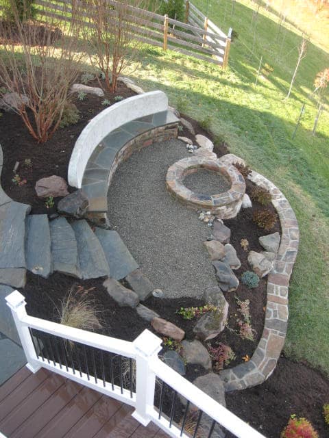 386 View from Deck of Stone Firepit and Custom Built-In Bench and Retaining Wall