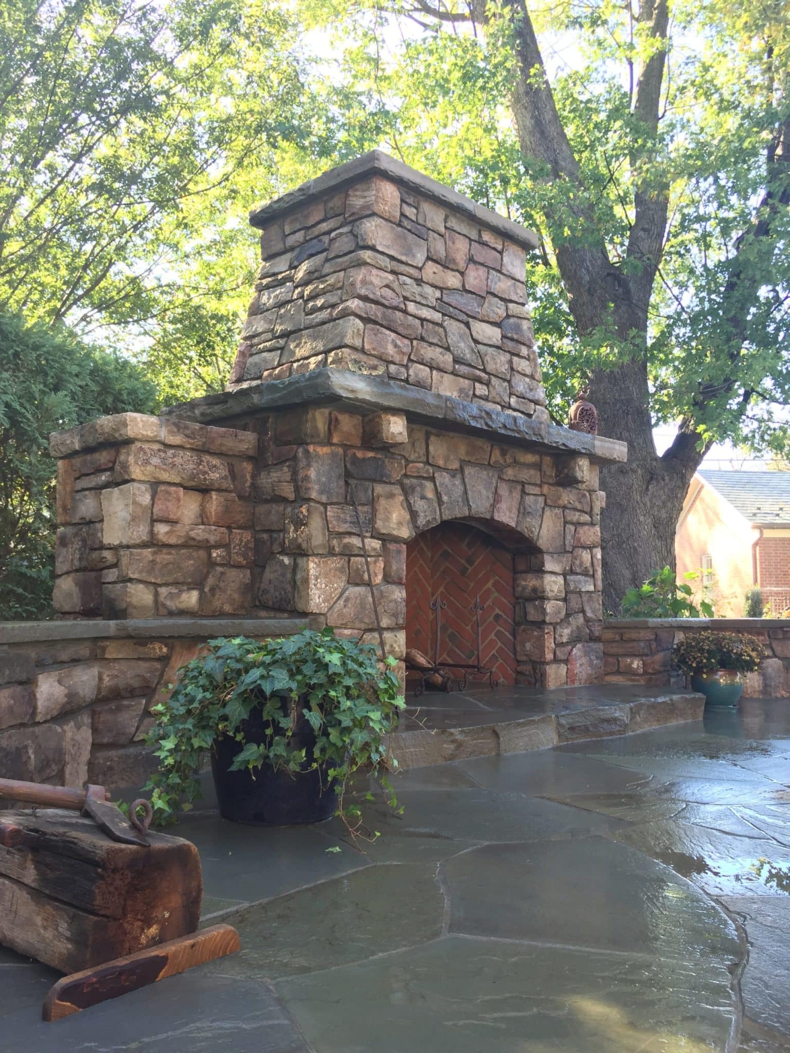 412 Stone Fireplace with Stone Slab Mantle and Brick Herringbone Firebox