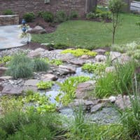 434 Hillside Plantings Flank a Waterfall