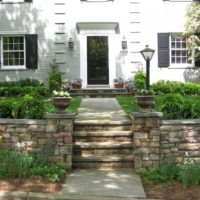 464 Elegant Front Flagstone Entry with Stone Retaining Walls Capped in Flagstone