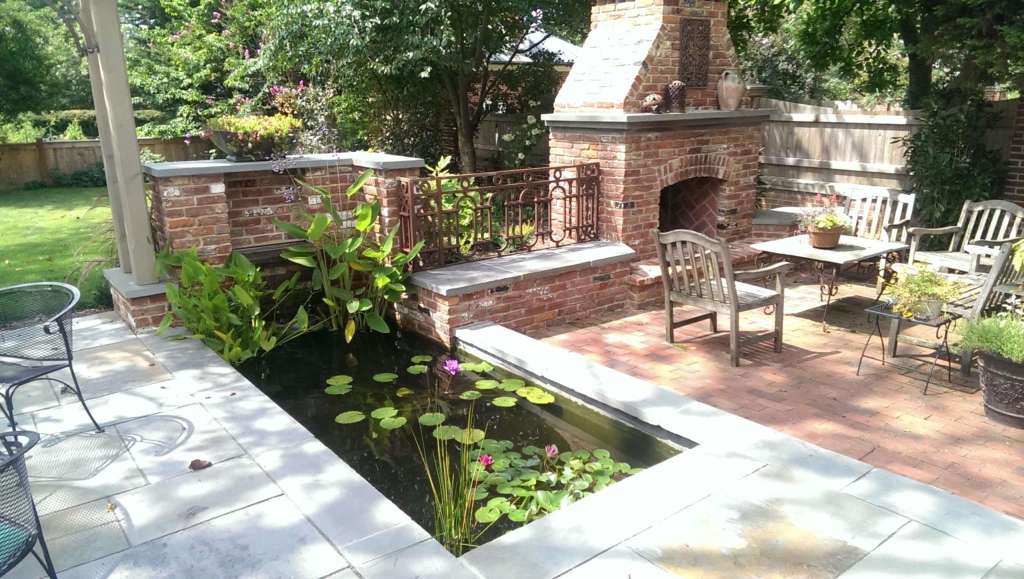 486 Brick and Flagstone Patios with Built-In Fish Pond, Brick Fireplace and Brick Walls with Flagstone Cap