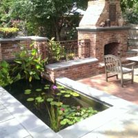 486 Brick and Flagstone Patios with Built-In Fish Pond, Brick Fireplace and Brick Walls with Flagstone Cap