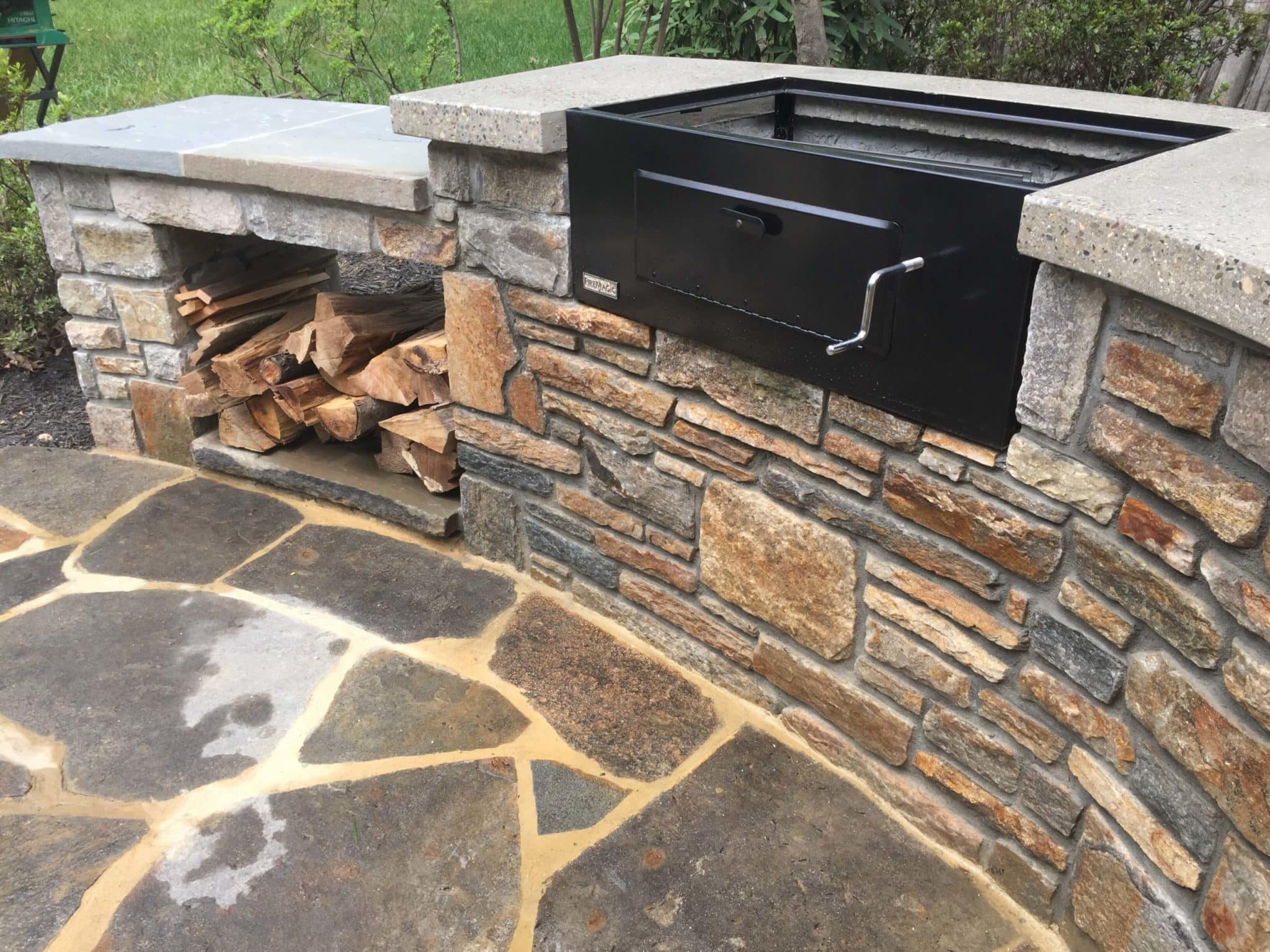529 Built In Charcoal Barbecue with Baltimore Wall Stone and Concrete Countertop