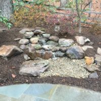 559 Pondless Waterfall Built Into a Wooded Hillside