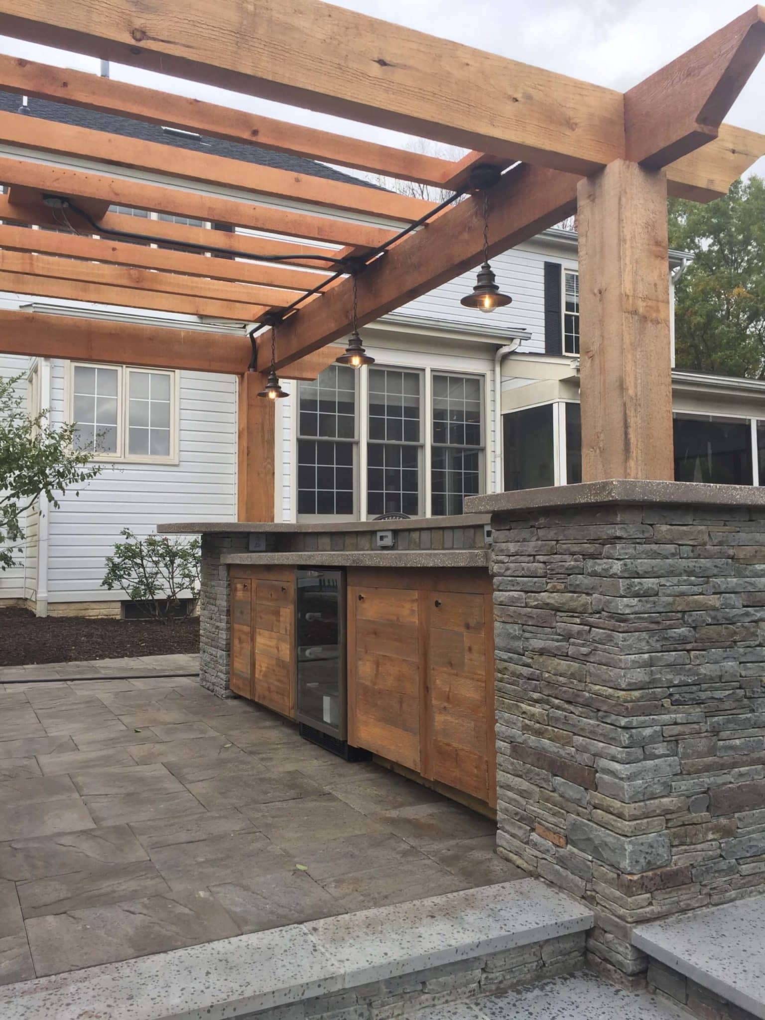 564 Custom Cedar Cabinetry and Pergola with Concrete Countertops
