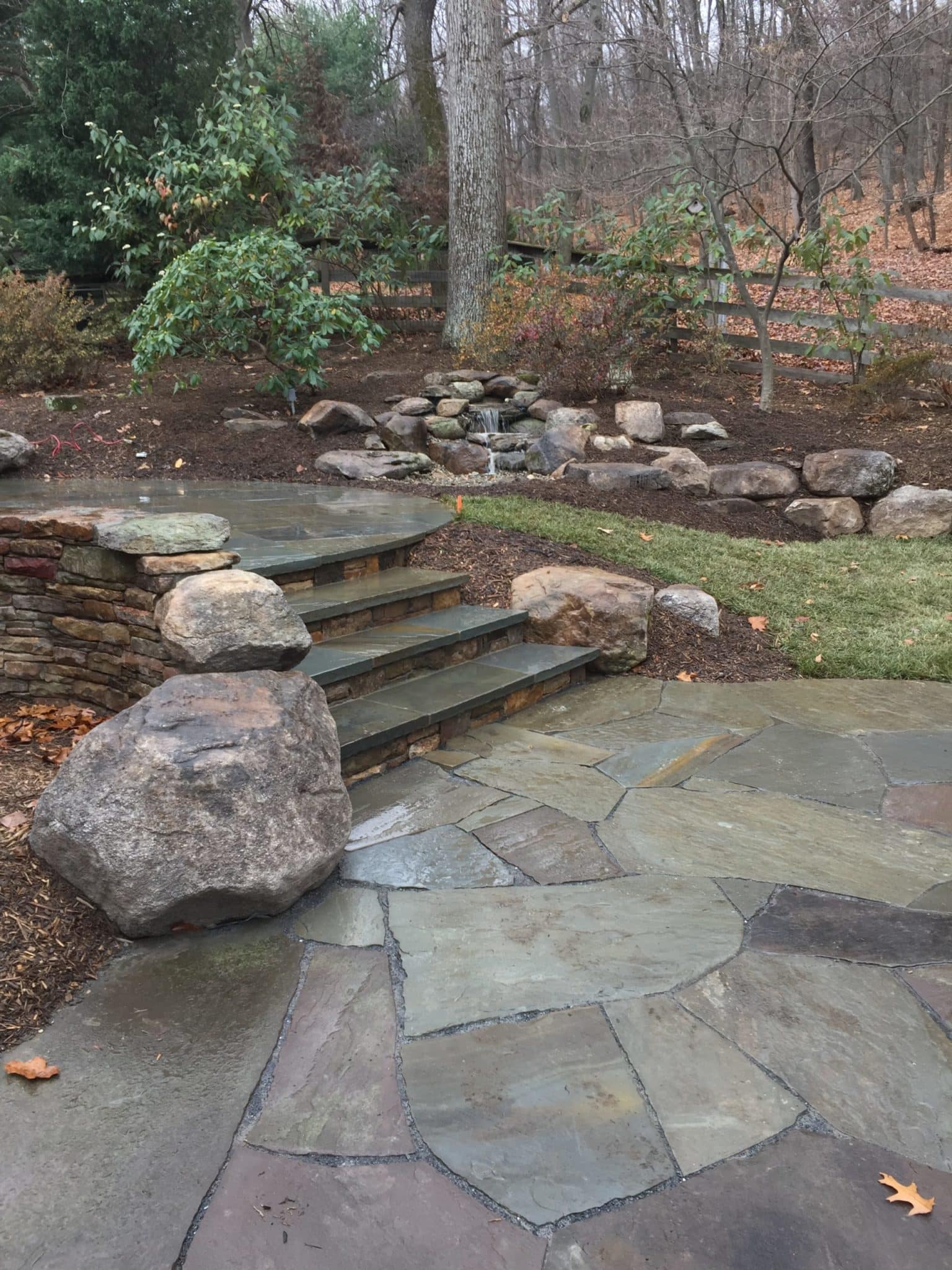 587 Boulders Integrated into Hillside and Waterfeature