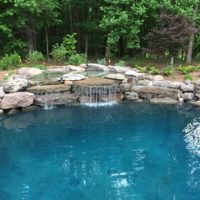 604 Residential Pool with PA Boulder Waterfall and Naturalized Edge