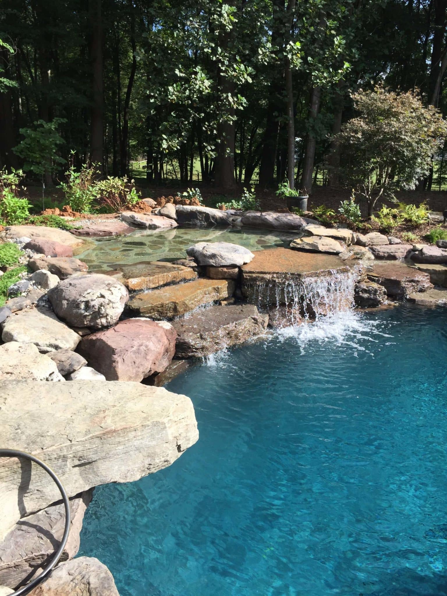 606 Residential Pool with PA Boulder Waterfall and Naturalized Edge