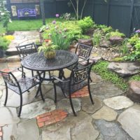 670 Informal Patio Featuring Irregular Flagstone, Salvaged Brick and Waterfeature