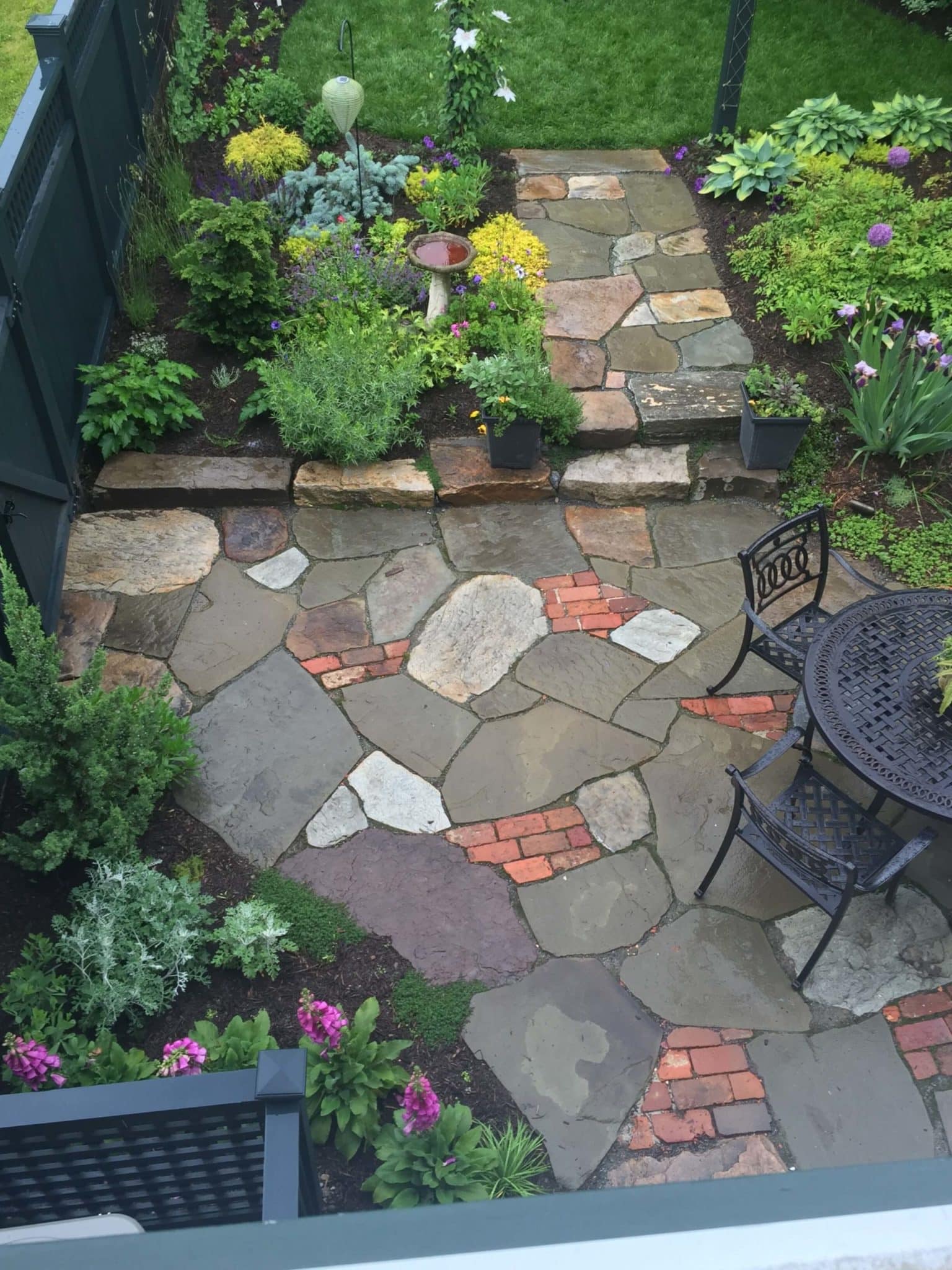 671 Informal Patio Featuring Irregular Flagstone and Salvaged Brick