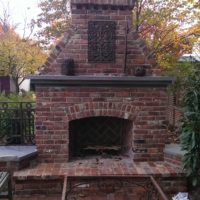 742 Brick Fireplace with Stone Mantle