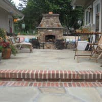8 Flagstone Patio and Courtyard with Stone Fireplace and Brick Accents