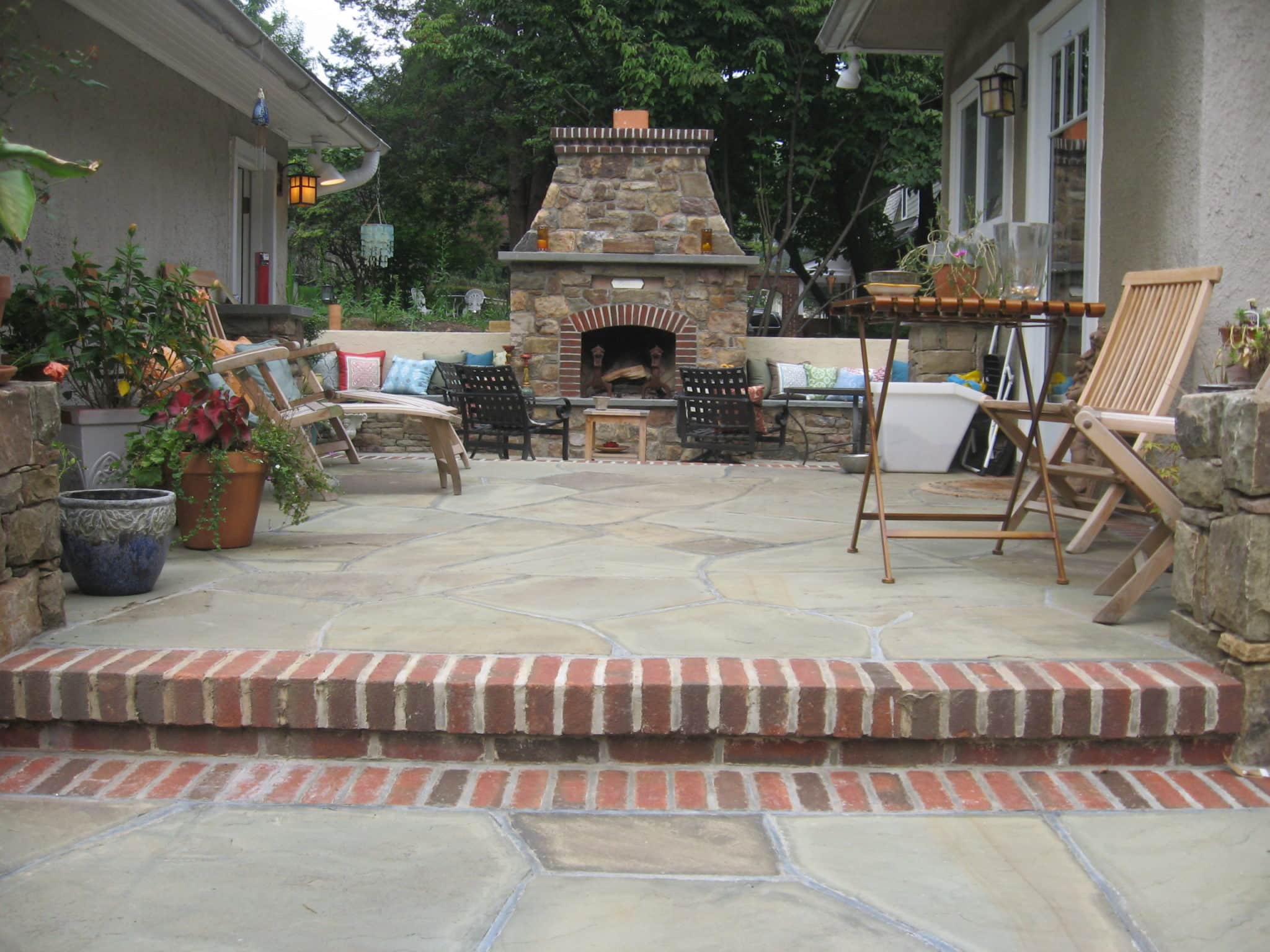 8 Flagstone Patio and Courtyard with Stone Fireplace and Brick Accents