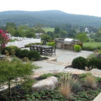 Formal Flagstone Patio with Stone Walls, Built In Grill, Boulders and Potager Garden 2