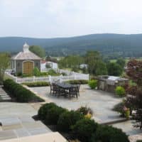 Formal Flagstone Patio with Stone Walls, Built In Grill, Boulders and Potager Garden 3